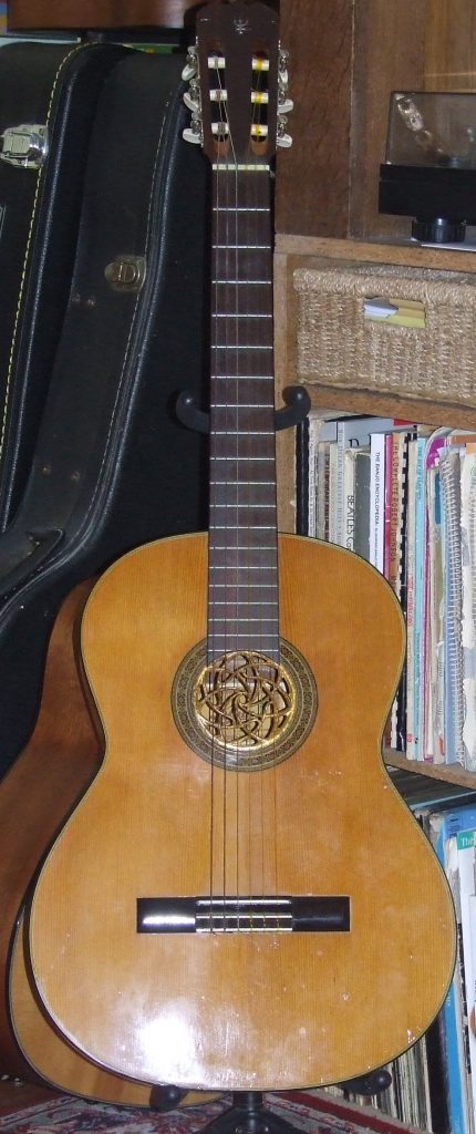 Aria Classical Guitar with gold soundhole rose